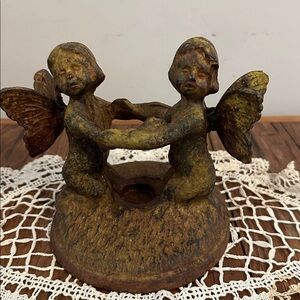 Cast iron vintage angel candle holder